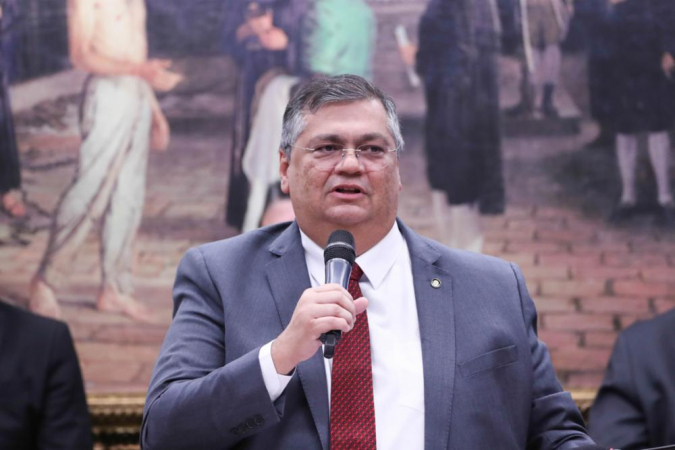 Dino diz que não recebeu informes da Abin e minimiza visita à Maré